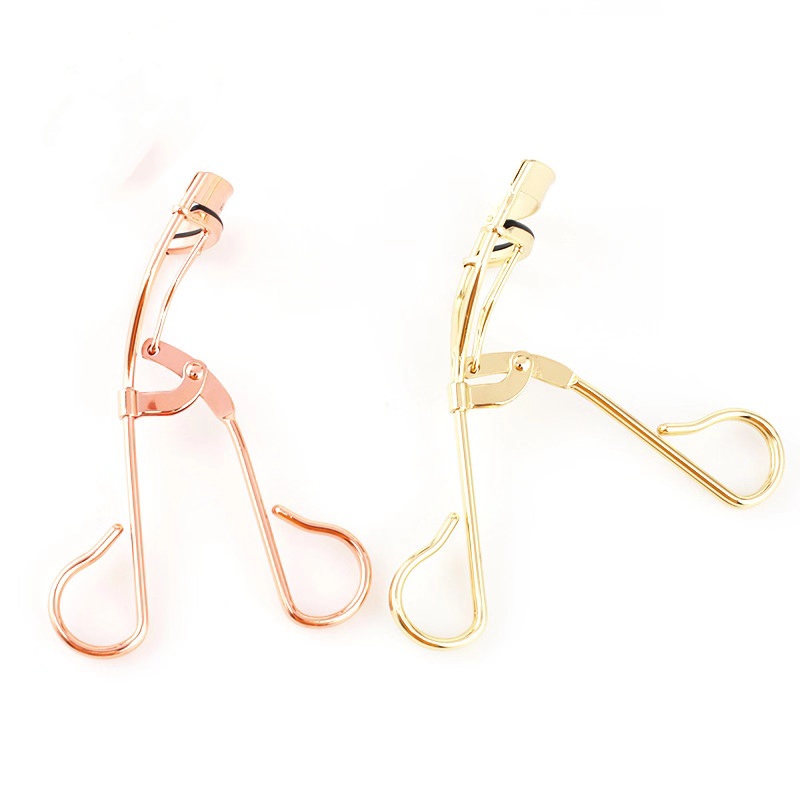 Gold lash curler.jpg